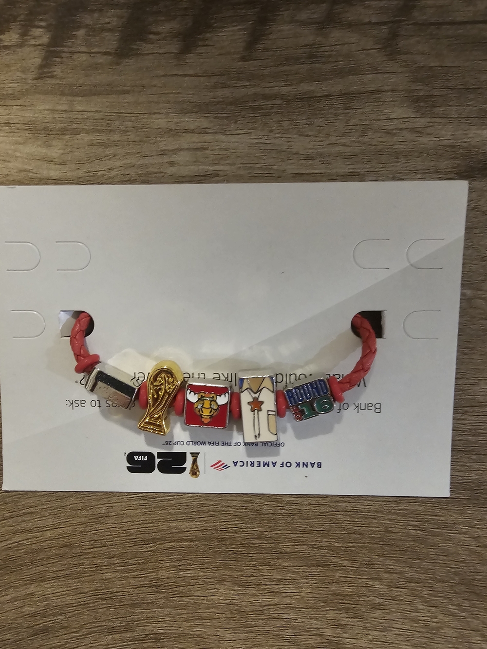 Red Charm Bracelet with Mixed Enamel and Gold-Tone Accents